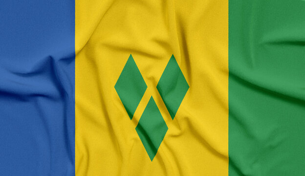 Saint Vincent and the Grenadines flag displays vibrant blue, yellow, and green vertical stripes with a central emblem.