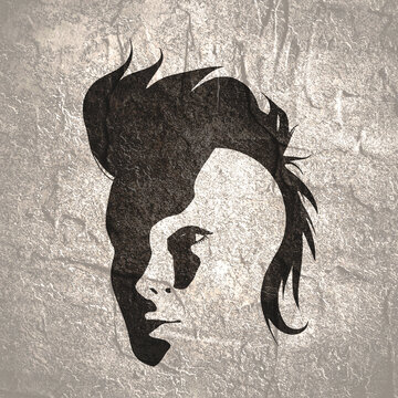 Young woman face half turn view in low key style. Elegant silhouette of a female head. Mohawk hairstyle