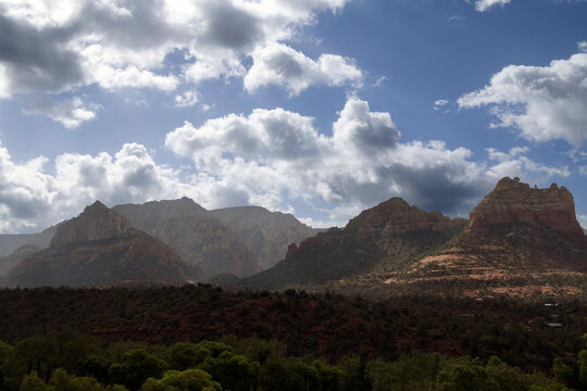 Dramatic clouds over Sedona red rock mountains