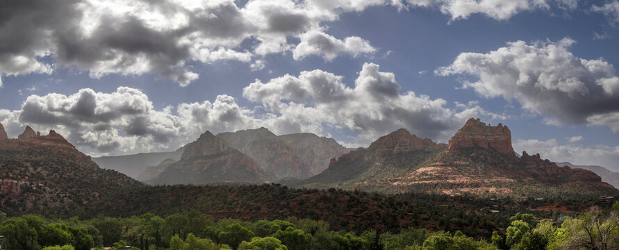 Dramatic clouds passing over Sedona red rocks panorama