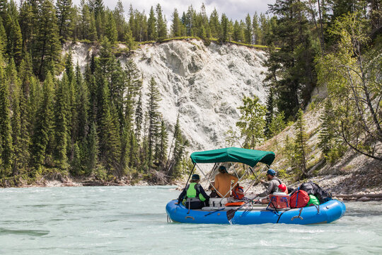 Friends on a river rafting expedition trip