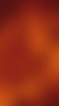 Seamless loop abstract motion background animation featuring soft blurred brown and amber gradient gradients with subtle grainy texture.