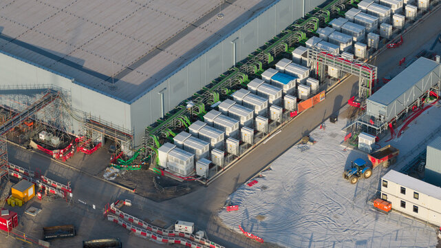 Farciennes, Wallonia, Belgium - 28 May 2026: Aerial drone view of a massive Google data center under construction, showcasing cloud computing, big data, AI and machine learning infrastructure.