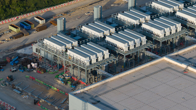 Farciennes, Wallonia, Belgium - 28 May 2026: Aerial drone view of a massive Google data center under construction, showcasing cloud computing, big data, AI and machine learning infrastructure.