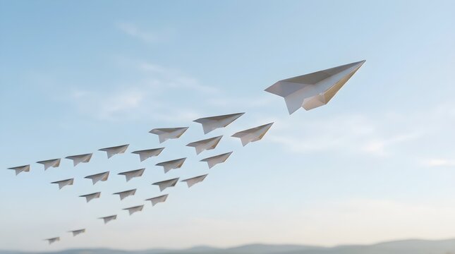 Business Expansion and Market Domination Concept Represented by Fleet of White Origami Paper Planes Aiming High in Soft Pale Blue Sky

