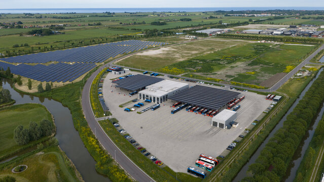 Purmerend, Netherlands - 15 June 2026: Aerial drone view of the EBS charging hub in Purmerend, zero emission buses, sustainable public transport infrastructure.