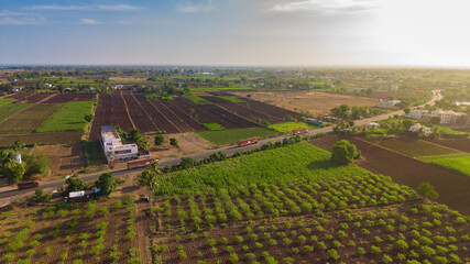 Rural Highway Passing Through Indian Farmlands and Agricultural Fields © VisualTreat12