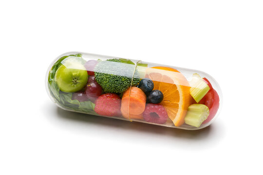 Clear capsule filled with fresh fruits and vegetables