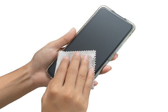 woman hand is wiped clean mobile phone with a cloth and alcohol to kill harmful virus, germs.