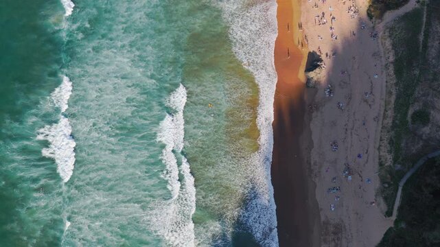 Surfer Riding Ocean Waves in Slow Motion on the Coast of Northern Spain