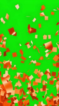 Orange confetti explosion on a green screen background, vertical video featuring festive celebration effects for Dutch soccer fans, sports broadcasts and chroma key editing