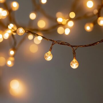 Warm string lights glow softly against a blurred background