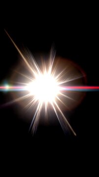 Glowing lens flare moving across an empty black background, vertical video featuring cinematic light streaks, radiant glow and elegant visual effects