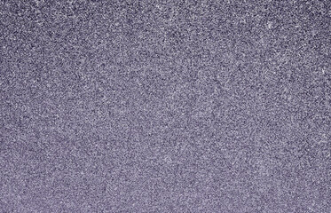 Fototapeta premium Purple glitter background with sparkling particles