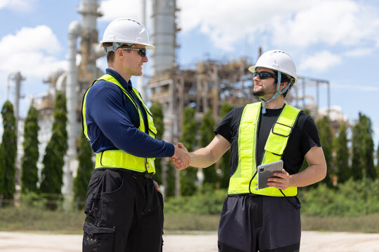 Engineers having a handshake after meeting