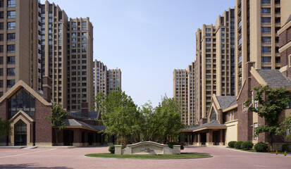 Modern Residential Complex Courtyard with High-Rise Apartment Towers © LyVan