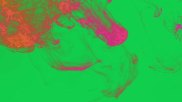 Color paint spill green screen chroma key asset showing organic liquid dye flow spreading in watercolor for advanced multi layer film editing software compositing video production clip......