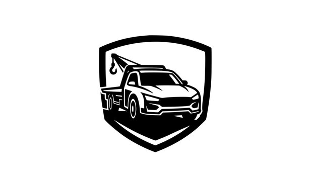 Modern tow truck emblem logo with vehicle recovery and towing service symbol