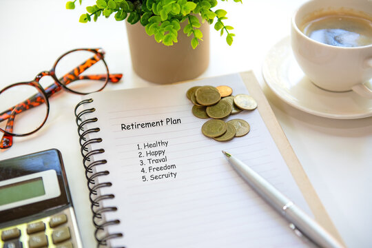Retirement planning with saving, calculate and notebook for future financial security.  Financial Wellness for retirement Concept