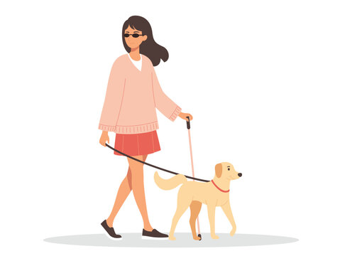 A blind woman in a pink sweater is walking and carrying her pet dog