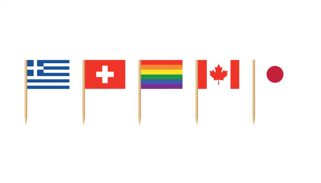 Tiny toothpick flags representing Greece, Switzerland, the rainbow pride, Canada and Japan on a white background.