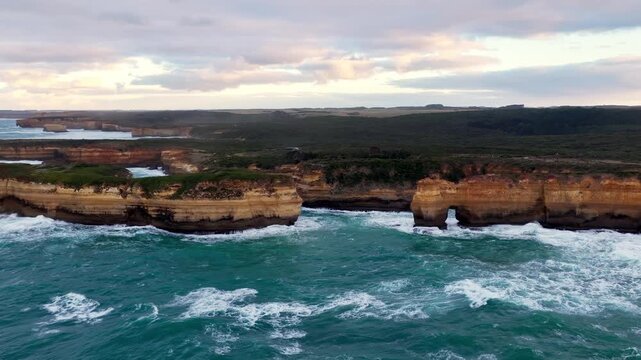 Aerial panorama of eroded scenic coast at Twelve Apostles marine park of Australia.