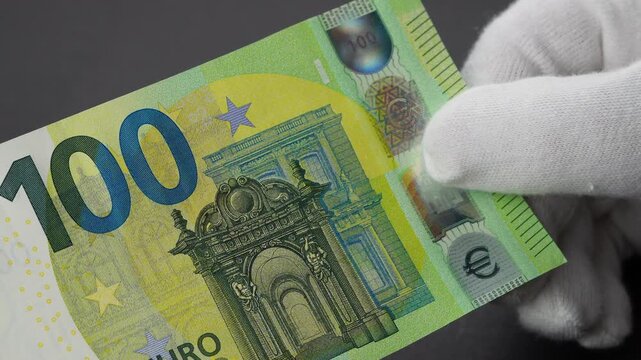 100 euro Banknote in hands, Europe, hands-on overview of European paper money, footage	