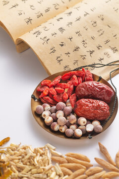 Traditional Chinese Herbal Medicine Ingredients Still Life with Ancient Text