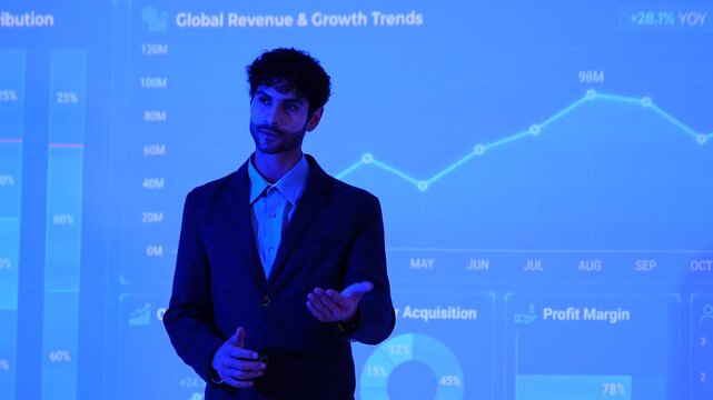 A male investment analyst presents the company's growth plan, including stock charts and computer-generated analysis of management systems, business intelligence, data statistics 