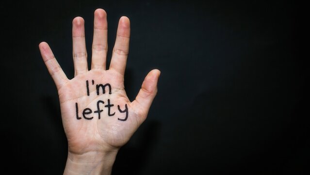 Hand with the text im lefty written on the palm