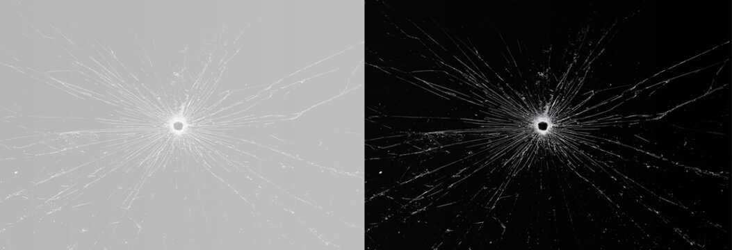 bullet hole in broken glass on gray and black background, realistic cracked window texture weapon shot damage overlay