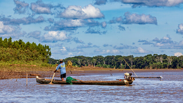 People fishing on the Beni River in the Amazon Basin near Rurrenabaque, Bolivia