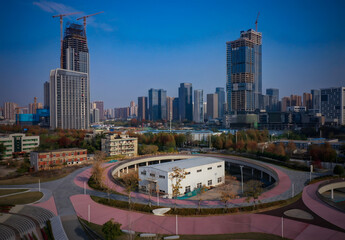 Wuhan Museum with Curved Architecture Blends with City Skyline and Yangtze River © DoMinh