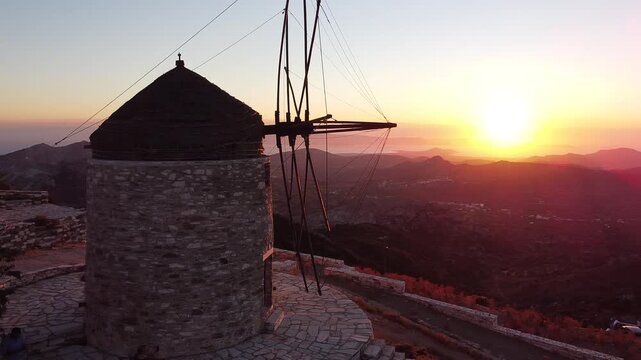 Sunset Calls Loch Shot on a Windmill viewpoint in Naxos Greece