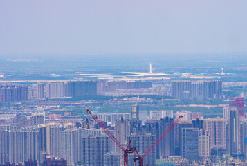 Guangzhou City Aerial View with Tower Complex and Construction Cranes © TranPhuoc