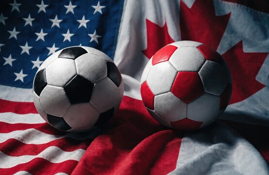 Soccer Balls on USA and Canada Flags Representing International Sports Rivalry and North American Football Competition