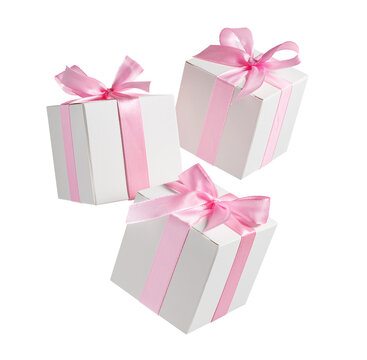 Gift boxes flying on white background