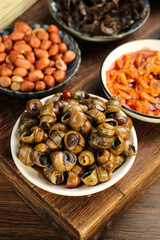 Guangxi Snail Delicacy With Seasonings and Side Dishes © DangThi