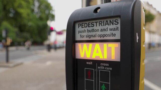 Illuminated Wait Sign On London Pedestrian Crossing Button