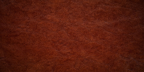 Fototapeta premium Rich, textured, reddish-brown leather surface, showing fine grain and subtle variations in color, perfect for a background or material texture.