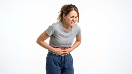Fototapeta premium Young Woman Suffering from Severe Stomach Pain Isolated on White Background