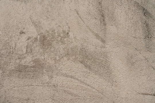 Beige concrete texture background with elegant warm cream cement wall backdrop.