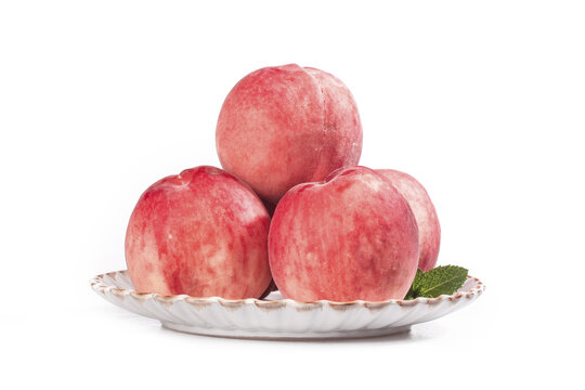 Fresh Yangshan Peaches on Plate with Mint Leaf