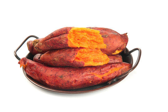 Fresh Roasted Sweet Potatoes in Rustic Bowl