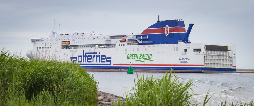 Swinoujscie, West Pomeranian - Poland - June 05, 2025: Polferries Varsovia ferry leaving port in Swinoujscie and sailing to Ystad. Transport passengers and cars