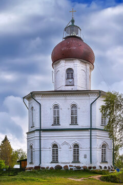 Ascension skete lighthouse church in Solovetsky, Russia side view. White brick walls historic stone monastery architecture