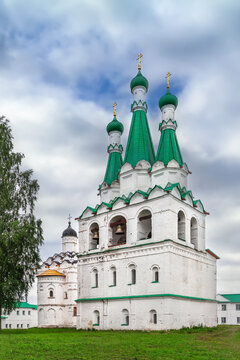 Monastery belfry tower in Svirskoye, Russia front view. Baroque stone church architecture, bell tower, white walls