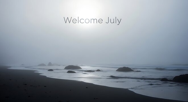 July summer beach scene with foggy horizon and boats.