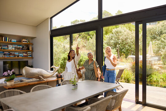 Friends Share a Moment in a Rental House