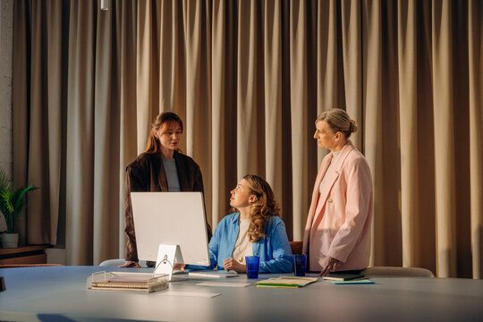 Three women working in the office